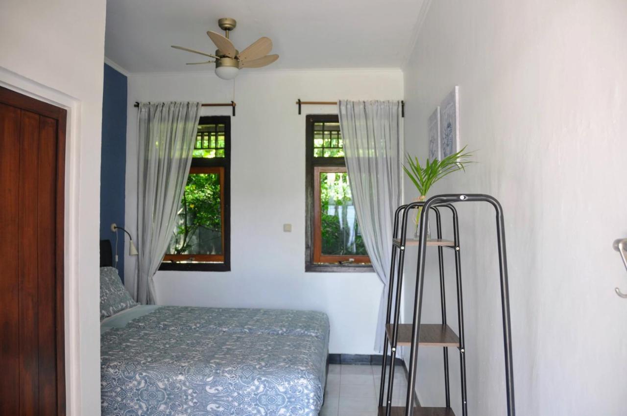 Guesthouse The 4 Fish มานาโด ภายนอก รูปภาพ